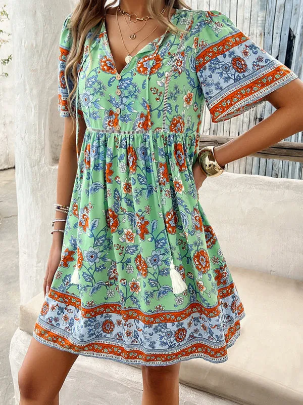 Bohemian Floral Print Dress with V-Neck and Tassel Details