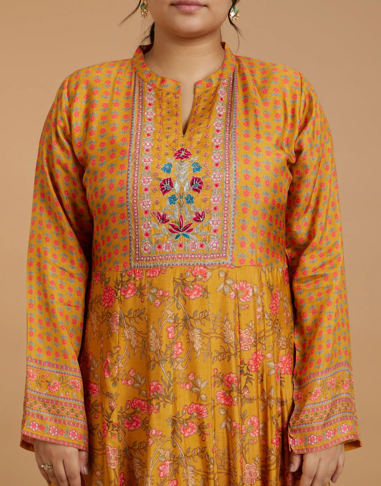 Cheerful Golden-Yellow Printed Flared Kurti With Hand Embroidered Yoke