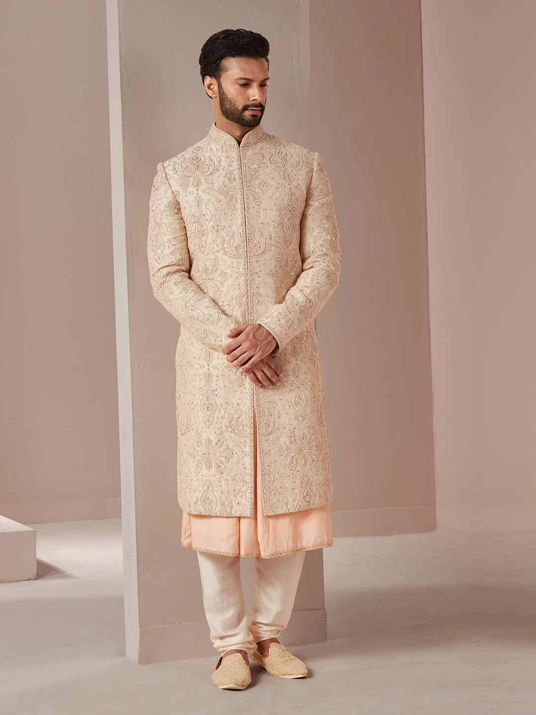 Classy Cream Sherwani with Contrasting Peach Undertone