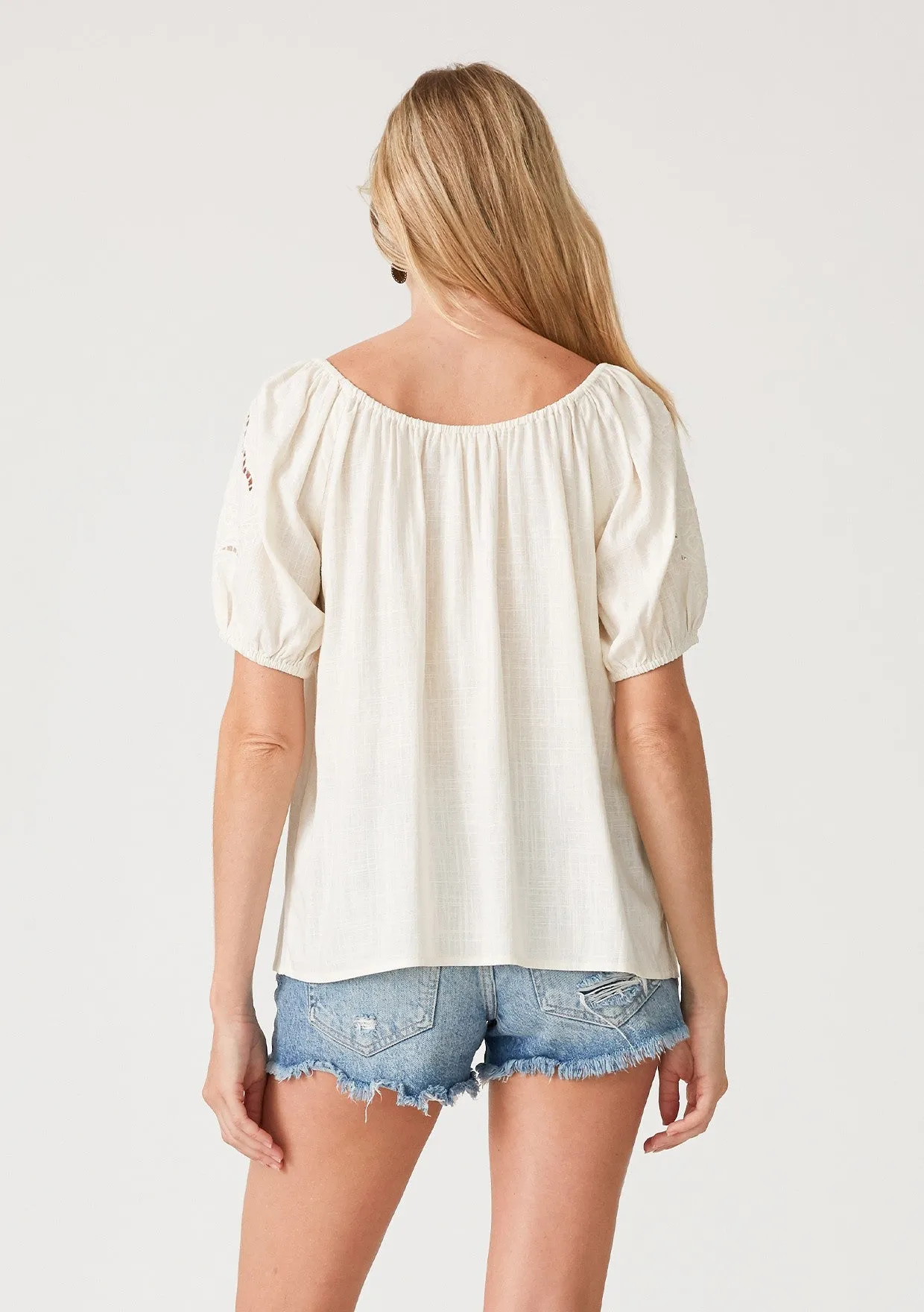 Cutout Embroidered Puff Sleeve Tassel Tie Blouse