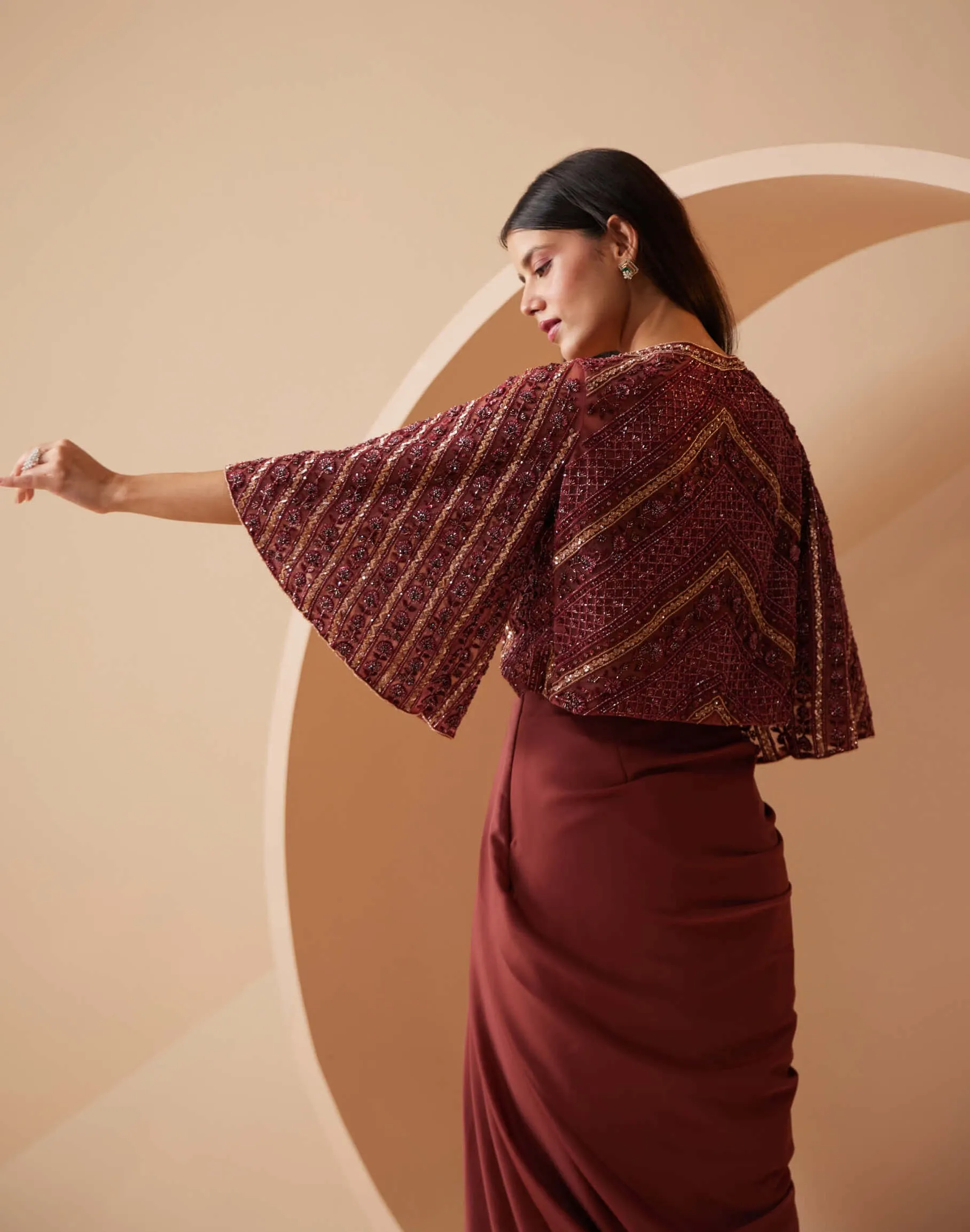 Divine maroon draped skirt set