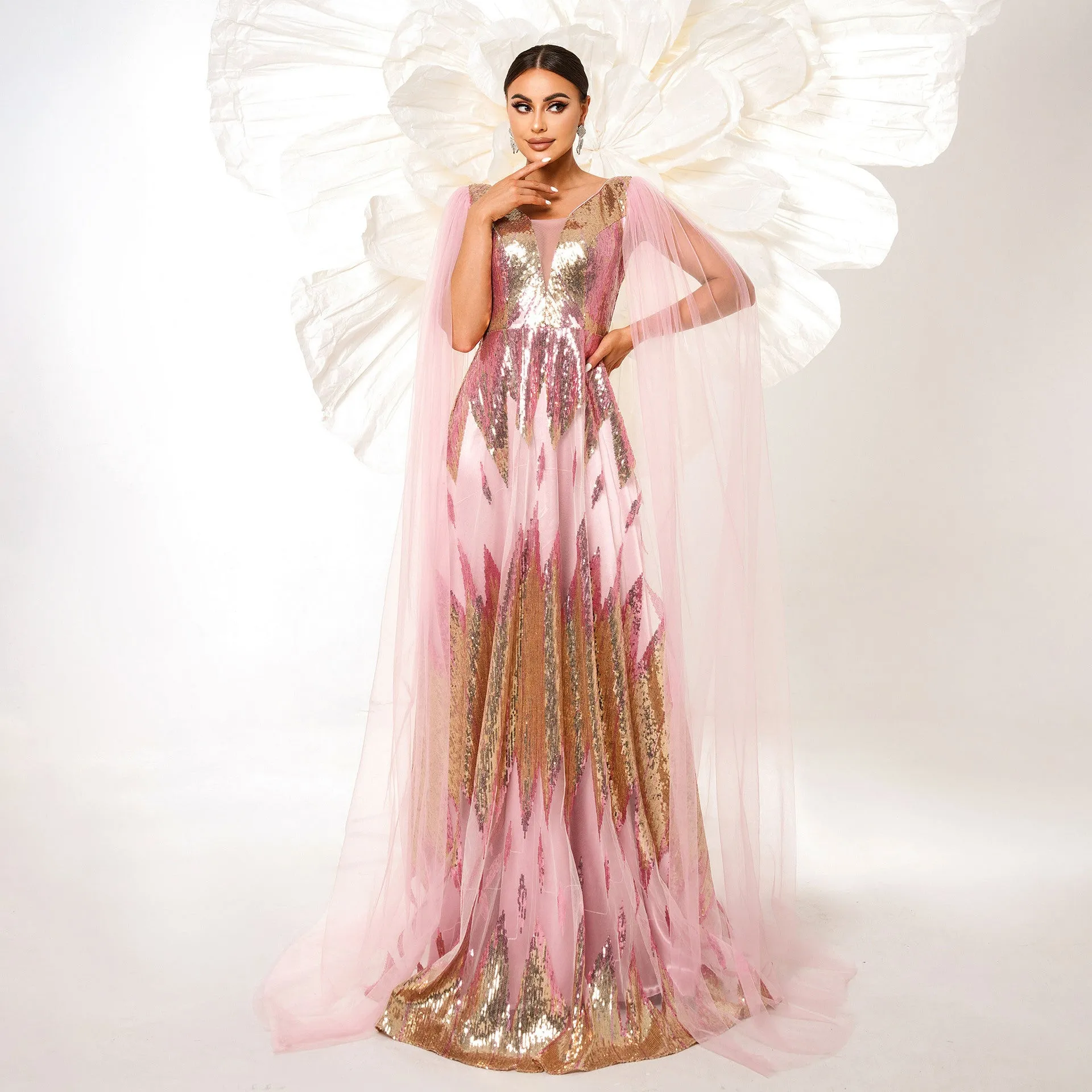 Ethereal Sequin V-Neck Gown with Sheer Mesh Overlay and Cape Sleeves