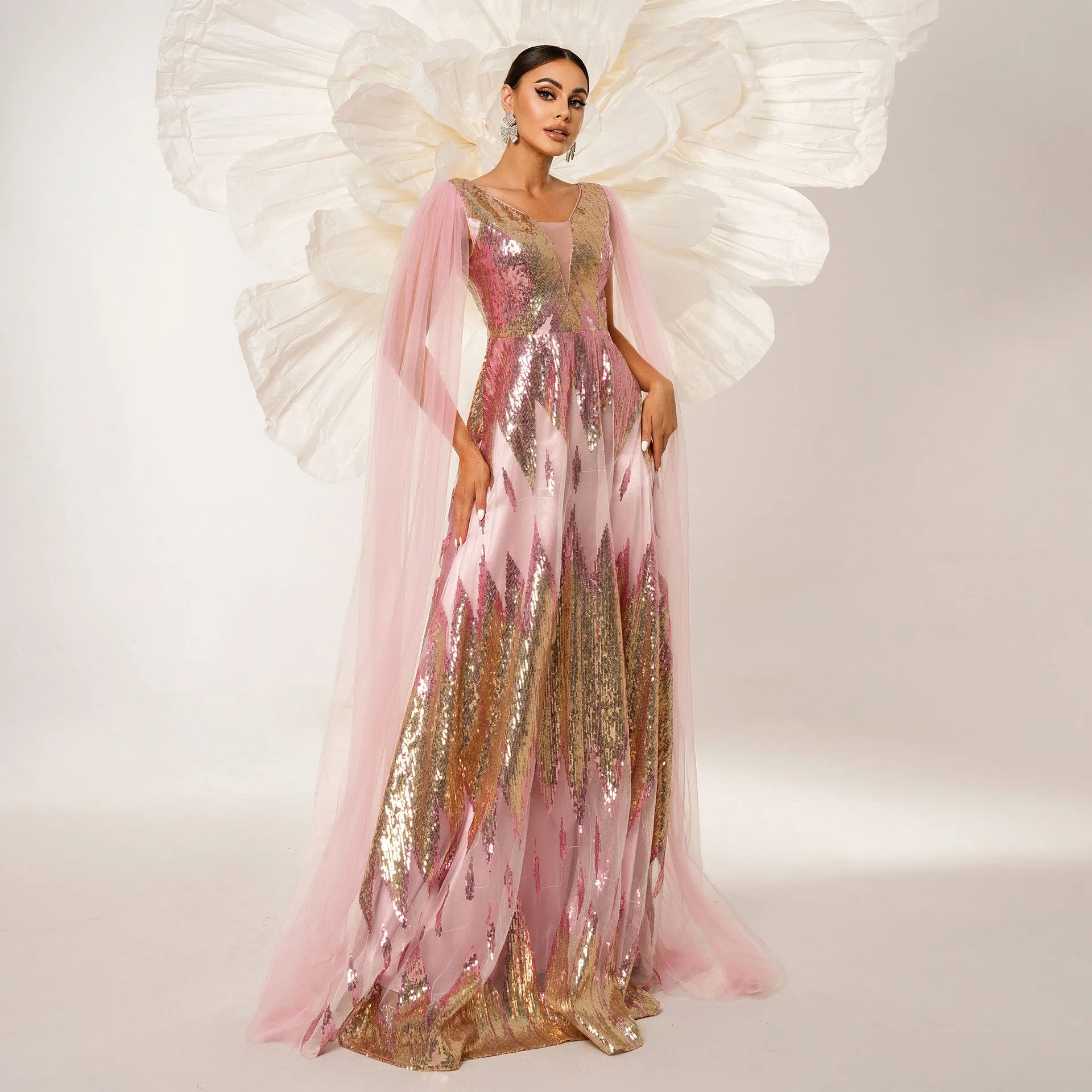 Ethereal Sequin V-Neck Gown with Sheer Mesh Overlay and Cape Sleeves