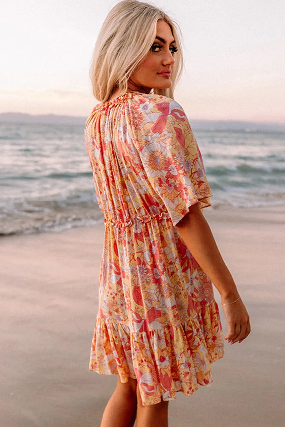 Floral Mini Dress with Flutter Sleeves and V-Neckline