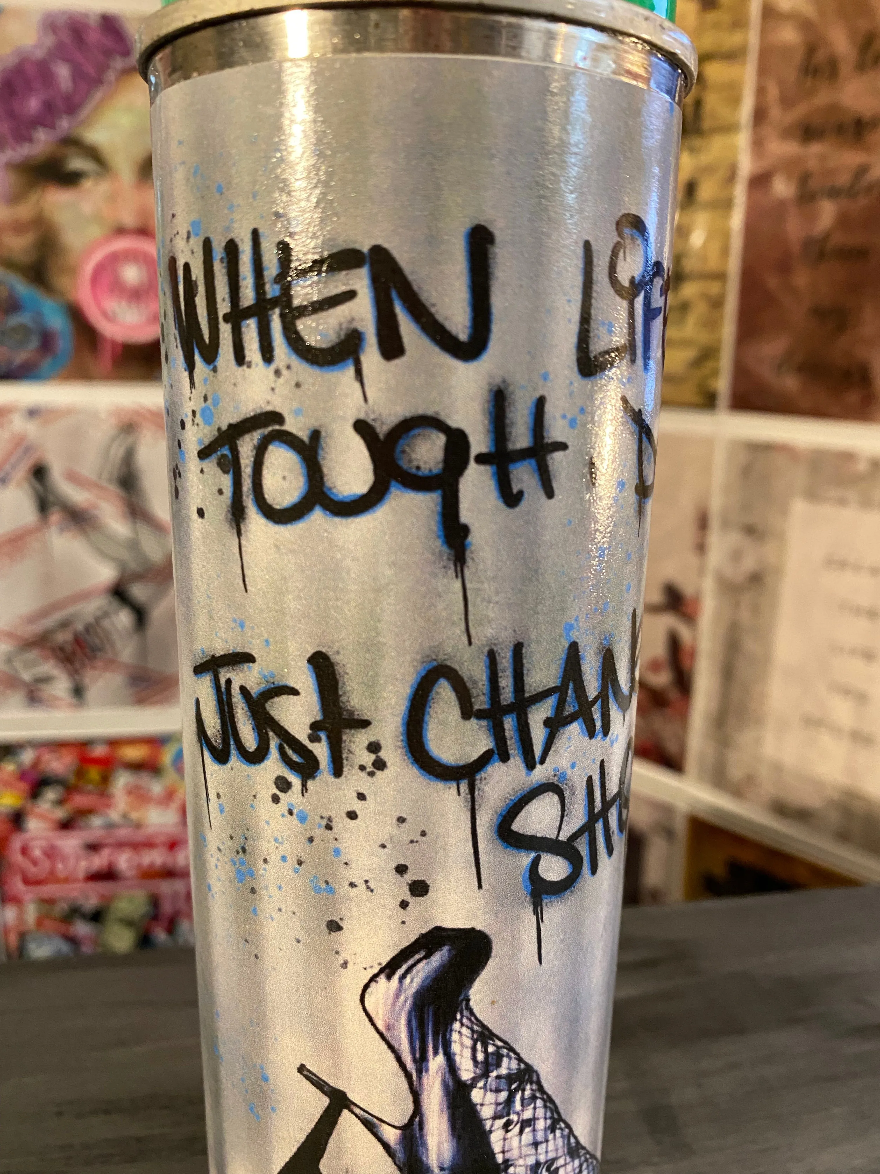 Guilty Chaos “when life gets tough, don’t quit” print covered spray can