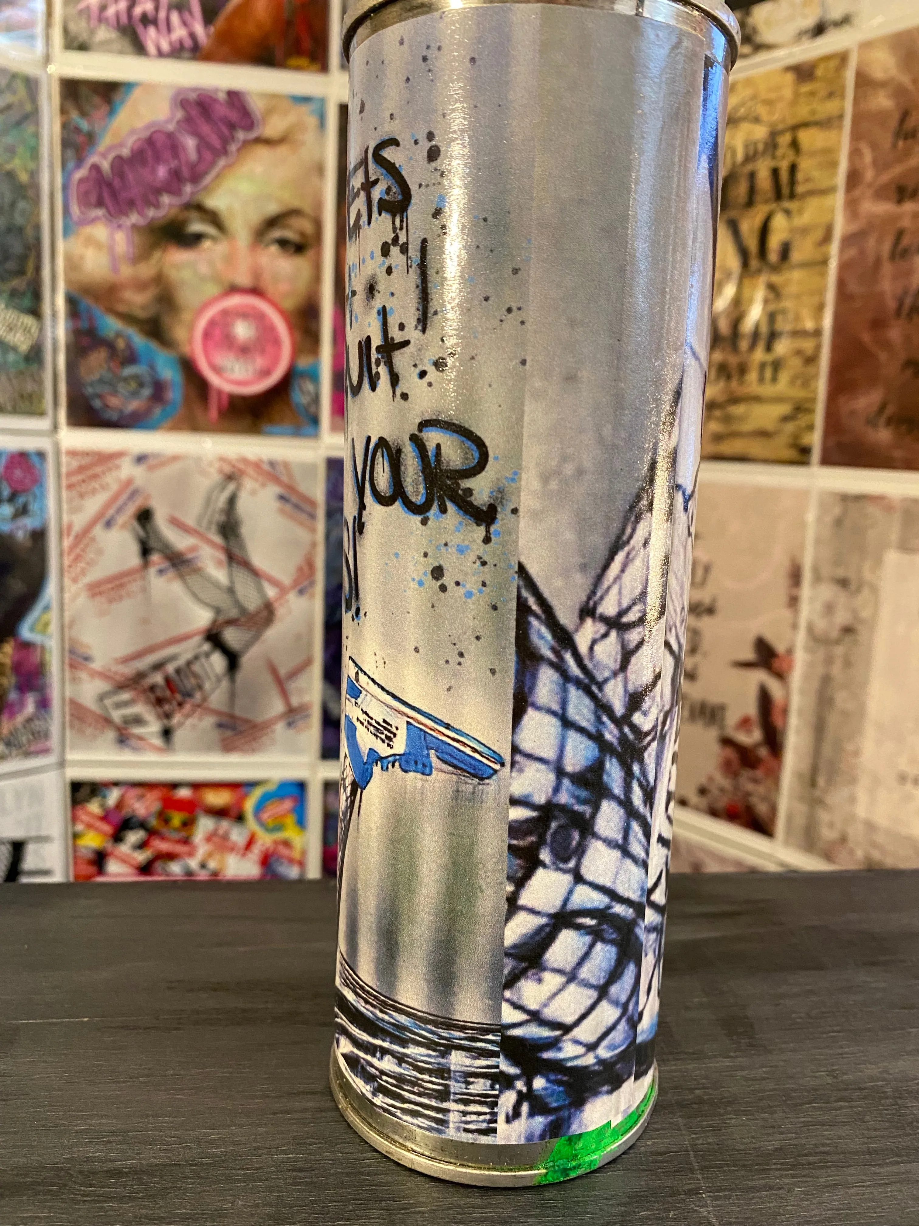 Guilty Chaos “when life gets tough, don’t quit” print covered spray can