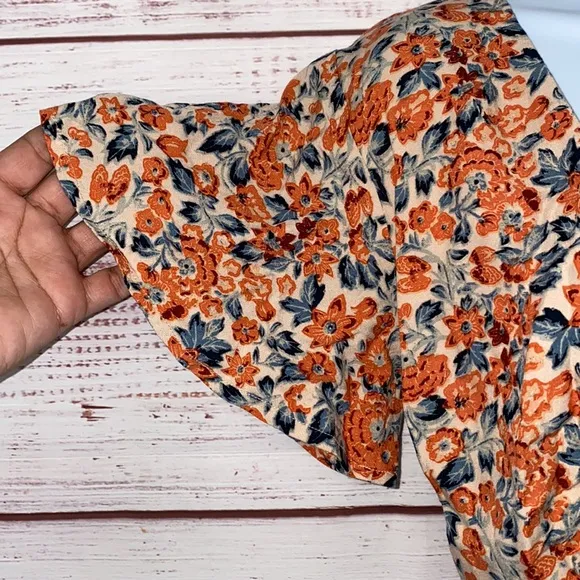 NWOT Free People Boho Surf Date Front Tie Copper Floral Cutout Romper.