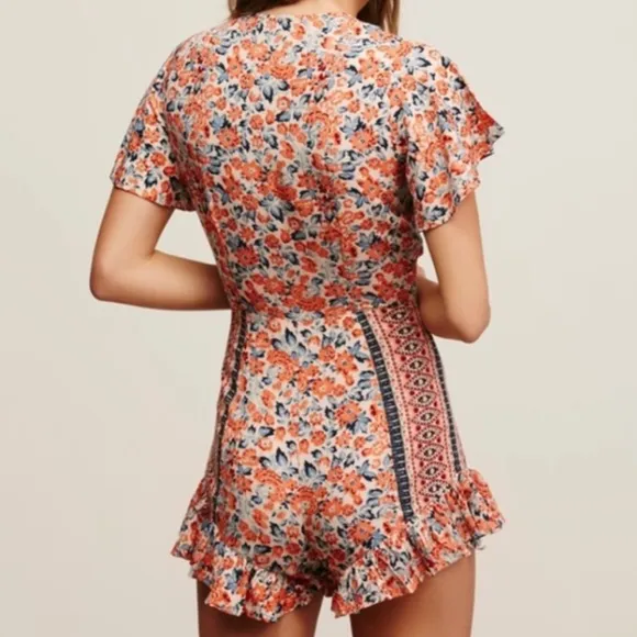 NWOT Free People Boho Surf Date Front Tie Copper Floral Cutout Romper.