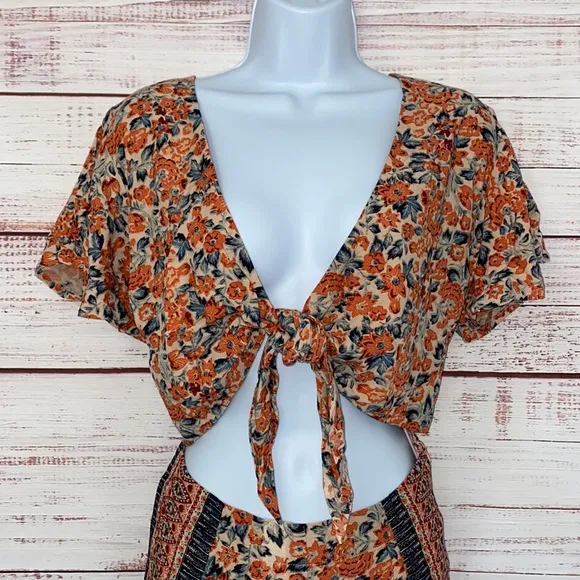 NWOT Free People Boho Surf Date Front Tie Copper Floral Cutout Romper.