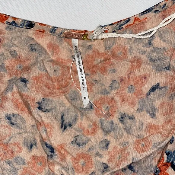 NWOT Free People Boho Surf Date Front Tie Copper Floral Cutout Romper.